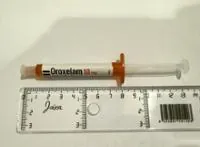 Envase del medicamento OROXELAM 10 MG SOLUCION BUCAL - Laboratorio Exeltis Healthcare S.L.